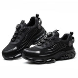 Black work sneakers with unique sole design on a white background